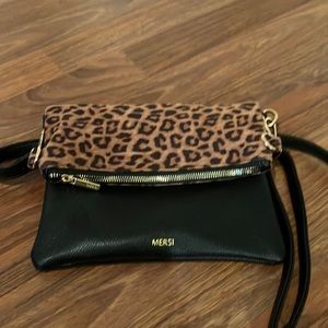 MERSI stylist vegan leather crossbody. It is in excellent conditions.